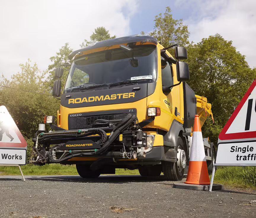 Roadmaster vehicle in action: Spotlight on making the change through efficient road maintenance.
